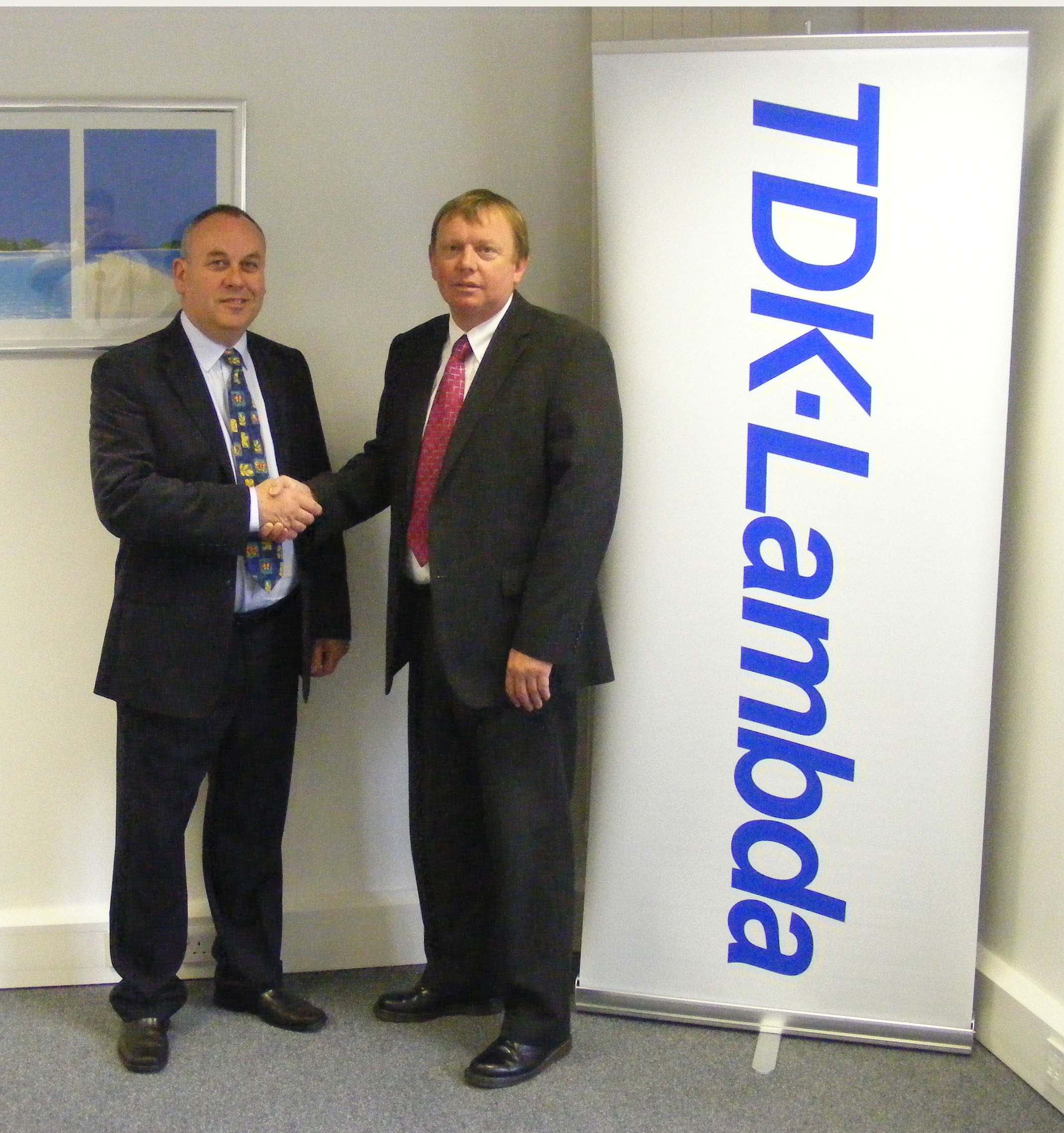 Steve Read, Sales Manager at TDK-Lambda UK (pictured right), welcomes new signing with Ideal Power’s Sales Director, Colin Marchington